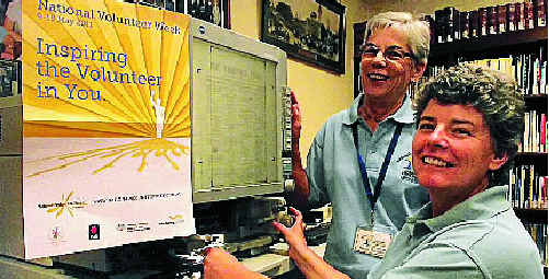Friends of the Gympie Regional Libraries’ Beth Wilson and president Ronis Birchley conducting research on the Microfilm Reader in the Local History Room at Gympie Library. Friends of the Gympie Regional Libraries’ Beth Wilson and president Ronis Birchley conducting research on the Microfilm Reader in the Local History Room at Gympie Library.